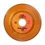 Text: "Vita-Min C", "Calibro 35". Orangefarbene Schallplatte mit zentraler Beschriftung und transparentem Vinyl., Single 12"