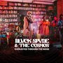Text: "BLVCK SPVDE & THE COSMOS - OVERJOYED THROUGH THE NOISE." Eine Band spielt in einem Raum voller Bücher., Single 12"