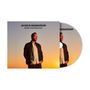 Text: "JAMES MORRISON, FIGHT ANOTHER DAY". Ein Mann in Jacke steht vor einem Sonnenuntergang. CD und Cover sind gezeigt., CD