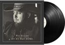 Text: "Wes Bayliss On My Way Home." Schwarz-weißes Porträt eines Mannes mit Hut auf einem Schallplatten-Cover.