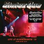 "Status Quo" in großem Schriftzug oben, darunter Konzertbühne mit Band in buntem Scheinwerferlicht, Text über Hammersmith '79., 2 CDs
