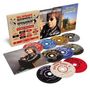 "Bill Wyman's Rhythm Kings Ultimate Collection" umfasst mehrere CD-Hüllen und bunte CDs mit Bildern und Texten auf den Covern.