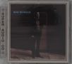 Text: "BOZ SCAGGS", "SUPER AUDIO CD". Dunkles Foto eines Mannes in einem Anzug, teilweise im Schatten.