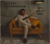 Ein Mann im Anzug sitzt auf einem gelben Sofa, hält ein Saxophon. Texte: „Adrian Cunningham“, „It's About Time“., CD
