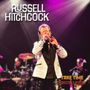 "RUSSELL HITCHCOCK", "TAKE TIME", "REMASTERED & REVISITED"; Sänger mit weißem Jackett auf einer Bühne, Mikrofon in der Hand., CD