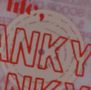 Roter Text "ANKY", darunter eine angedeutete Kreisform im Hintergrund., LP