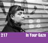 Text: "217 In Your Gaze". Schwarz-Weiß-Foto einer Frau vor einem Rolltor, mit ernstem Gesichtsausdruck., LP