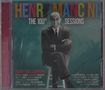 "Henry Mancini: The 100th Sessions" in bunten Buchstaben. Schwarz-weißes Foto eines Mannes im Anzug, Arme verschränkt., CD