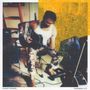 Texte: "SHAKEY GRAVES", "FONDNESS, ETC." Mann spielt Gitarre in einem Raum, daneben ein Mikrofon, orange-gelber Hintergrund., LP