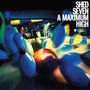 Text: "SHED SEVEN A MAXIMUM HIGH." 
Bowlingkegel und -kugel fliegen dynamisch durch die Luft. Beleuchtung ist bunt und lebendig.