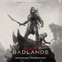 Text: "Predator Badlands." Unter einem Krieger mit Maske, Schwert und einem Kind auf der Schulter, begleitet von einem Wesen., LP