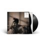 Text: "CONFESSIONS OF A LONELY HEART", "ERIC NAM". Schwarz-weiß Bild, Mann sitzt nachdenklich auf Bett., LP