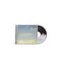 Text: "KINGS OF LEON O MY BELOVED". CD-Hülle zeigt Himmel mit Wolken, daneben eine CD mit weiteren Texten., CD