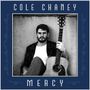 Text: "COLE CHANEY" oben, "MERCY" unten. Ein Mann lehnt sitzend mit einer Gitarre an einer Wand. Rahmen in Blau mit Verzierungen., CD