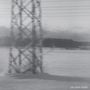 Text: "tacoma radar". Ein Strommast in einer verschneiten Landschaft mit bewölktem Himmel., CD
