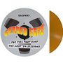 Text oben: "STEREO".  
Farbige Schrift: "CANNED HEAT".  
Handschrift: "THE TIES THAT BIND THE LOST '74 SESSIONS".  
Tonbandspule mit braunem Vinyl., LP