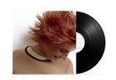 Text: "Reneé Rapp, Snow Angel". Ein lächelnder Mensch mit roten Haaren, sichtbar auf einem Plattencover., LP