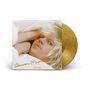 Text: "Connan Mockasin" und "CARAMEL". Ein Plattencover zeigt eine Person mit blonden Haaren. Goldene Vinyl-Schallplatte.