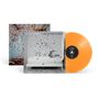 Schwarze Marmor, Leben in kleinen Räumen. Orangefarbene Vinylplatte, Albumcover mit liegender Person und Konfetti., LP