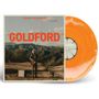 Titel "GOLDFORD" oben "ORANGE BLOSSOMS". Ein Mann mit Gitarre in wüstenartiger Landschaft. Orangefarbene Vinyl-Schallplatte., LP