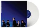 Text: "BRIGITTE CALLS ME BABY / IRREVERSIBLE". Fünf Personen in schwarzer Kleidung vor blauem Hintergrund, weiße Vinyl-Schallplatte., LP