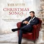 "Mark Keller: Christmas Songs of my Life. Vogtland-Philharmonie Singakademie Chemnitz." Mann im Anzug auf rotem Sessel., CD