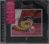 Text: "A BOUNDARY-SMASHING DISCO CLASSIC...". Cover zeigt Cocktailglas auf pinkem Boden, Fuß in elegantem Schuh., CD