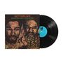 "Motherland: The Visitors... Earl & Carl Grubbs." Schallplatte neben Cover mit zwei stilisierten Gesichtern., LP