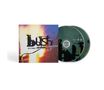 "BUSH RAZORBLADE SUITCASE" auf einem Albumcover mit Flammenmotiv; zwei CDs daneben., 2 CDs
