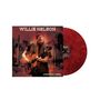Text: WILLIE NELSON, AMERICAN REBEL. Illustration eines Mannes mit Gitarre vor Wüstenlandschaft. Rote Vinylplatte., LP