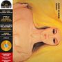 Text: "1970 - CULT CLASSIC STATUS", "BLONDE ON BLONDE", "REBIRTH". Illustration: Frau mit langen, gelben Haaren.