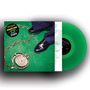„Living the Dream“, „Howlin' Jaws“, „Limited Edition“. Grünes Vinyl, schwarze Schuhe, Kette auf grünem Hintergrund., LP