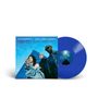 Text: Camp Claude, Never Say Never. Drei Personen vor einer Pyramide. Eine blaue Vinyl-Schallplatte ist rechts sichtbar., LP
