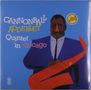 Illustration eines Mannes in blauem Anzug mit rotem Saxophon. Text: "Cannonball Adderley Quintet in Chicago".