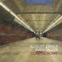 Text: "August Zirner Sven Faller Coming Home". Eine U-Bahn-Station, einsame Atmosphäre, warme Lichter., CD