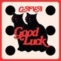 Text: "CAYA Good Luck". Zwei schwarze Katzen mit roten Augen, umrahmt von schwarzen Punkten und einem roten Rand., LP