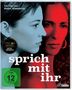 Texte: "Ein Film von Pedro Almodóvar", "Oscar Preisträger Bestes Drehbuch", "sprich mit ihr", "FSK ab 12 freigegeben". Zwei überlagerte Gesichter in Blau und Rot.