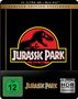 "4K ULTRA HD + BLU-RAY", "LIMITED EDITION STEELBOOK", "JURASSIC PARK", FSK 12-Symbol, Dinosaurier-Logo in Rot und Schwarz., 1 Ultra HD Blu-ray und 1 Blu-ray Disc