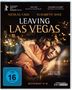 "Leaving Las Vegas" zeigt eine Frau und einen Mann in einer innigen Umarmung, umgeben von unscharfen Lichtern.