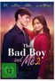 "The Bad Boy and Me 2", FSK 12, zwei lächelnde Personen eng umarmt vor unscharfem Stadtlichter-Hintergrund., DVD