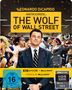 "The Wolf of Wall Street" in gelbem Kasten. Mann im Anzug, Party-Szene im Hintergrund. 4K Blu-ray Angaben. FSK 16., 1 Ultra HD Blu-ray und 2 Blu-ray Discs