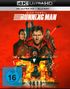Text: "4K ULTRA HD," "BLU-RAY," "Glen Powell," "The Running Man," "FSK ab 16 freigegeben." Actionreiche Szene mit Explosionen., 1 Ultra HD Blu-ray und 1 Blu-ray Disc