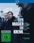 "Der Magier im Kreml" in großer Schrift darauf Namen und Details. Zwei Männer in Anzügen, Stadtkulisse im Hintergrund., Blu-ray Disc