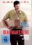 "Dead Man's Wire", Vorab-Cover FSK 16, zeigt einen Mann in grünem Hemd mit Arm in blauer Schlinge, der ein Paket trägt., DVD