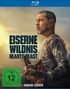 Text: "Eiserne Wildnis: Heart of the Beast", "FSK ab 12 freigegeben", "Vorab-Cover". Mann mit Bart in Tarnkleidung mit Hund., Blu-ray Disc