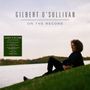 "GILBERT O'SULLIVAN ON THE RECORD. Person sitzt auf einem Hügel am Wasser, im Hintergrund Bäume.", LP
