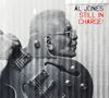 Text: "AL JONES STILL IN CHARGE!" Schwarz-weiß Bild eines älteren Mannes mit Gitarre., CD