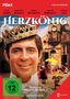 "Herzkönig" steht groß auf einem roten Hintergrund. Ein lächelnder Mann mit Krone im Vordergrund, fröhliche Szene im Hintergrund., DVD