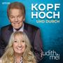 "Artcom Music Group", "Kopf Hoch und Durch", "Judith & Mel". Ein lächelndes Paar vor blauem Hintergrund.