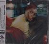 ARLO PARKS, Ambiguous Desire. Person im Auto, seitlich und nach hinten schauend, in bunter Lichtstimmung., CD